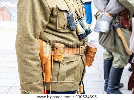 Vintage Leather Holster, Binoculars And Other Ammunition On The Belt. Retro Uniform Of Russian Army 