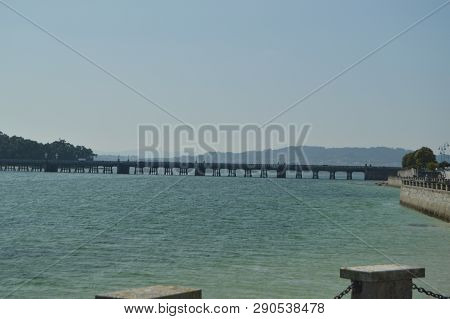 Bridge That Communicates The Island Of The Toja With The Grove. Nature, Architecture, History, Trave