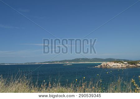 Wonderful Beach Of Area Gorda In La Lanzada In Noalla. Nature, Architecture, History, Travel. August