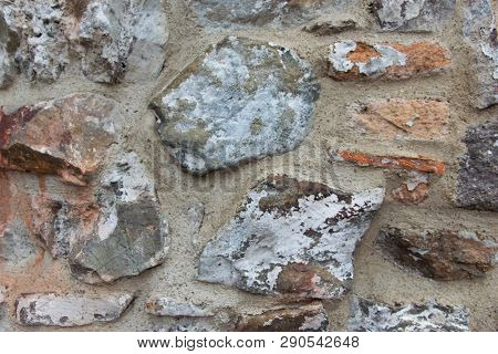 Structural Wall Of The Ancient Building Of The Last Century From A Stone. Old Brick Wall Texture. Gr