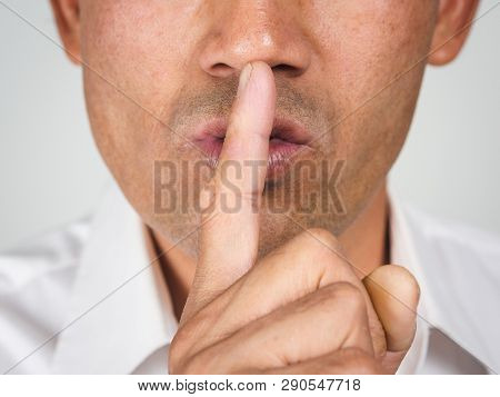 The Man Making Finger On Lips Silence Gesture, Pst, Shh,
