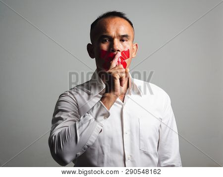 The Man Making Finger On Lips Silence Gesture, Pst, Shh,