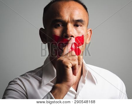 The Man Making Finger On Lips Silence Gesture, Pst, Shh,