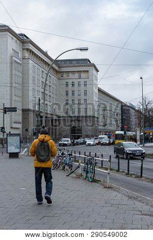 Berlin, Germany- December 12, 2018: Man Tourist Walking Down The Petersburger Str. In The District O