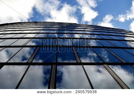 Viev From Below On The Office Building From Glass,