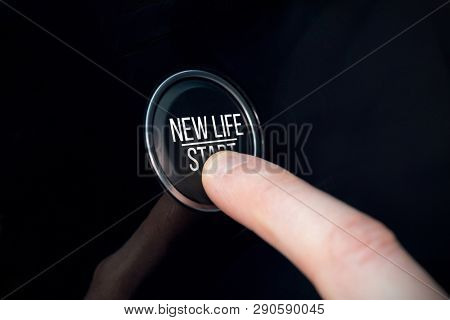 New life start in capital letter against finger pressing a button