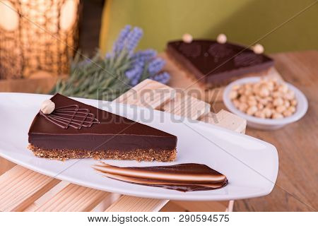 Homemade Belgian Chocolate Cake Served In White Plate - Gluten Free.