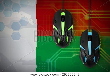 Madagascar Flag  And Two Mice With Backlight. Online Cooperative Games. Cyber Sport Team