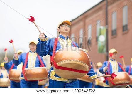 Holland, Michigan, Usa - May 12, 2018 Chinese Drummers Promoting Falun Dafa Performing At The Muziek