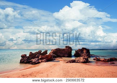 Crete Landmark Elafonissi Beach With Pink Sand, Blue Sea And Cloud Sky. Crete, Greece
