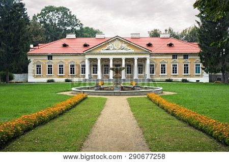 Beautiful Chechelya Manor With Fountain And Green Lawn In Front On A Cloudy Day, Samchyky, Khmelnyts