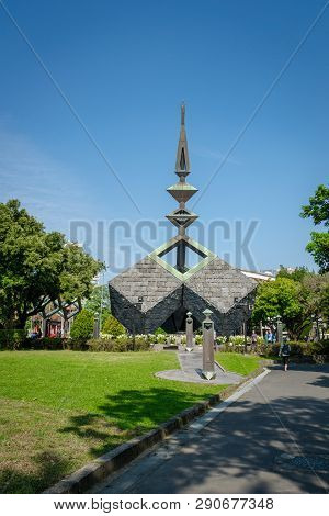Taipei, Taiwan - March 2019: 228 Memorial Park With The Massacre Monuments. 228 Memorial Park Is Loc
