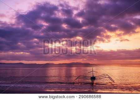 Traditional Philippine Boat In Corong-corong Beach In El Nido At Sunset Lights. Palawan Island, Phil