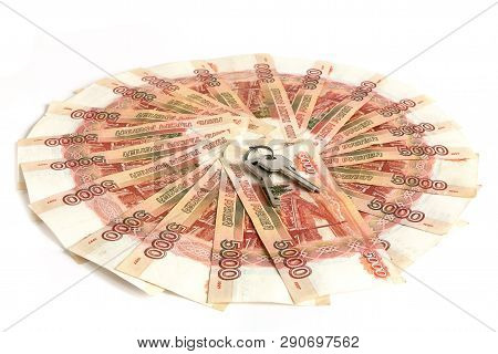 Cash On White Background. The Keys To The Apartment, The House On The Money. Bills 5 Thousand Rubles