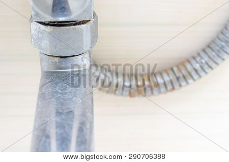 Detail Of Dirty Calcified Shower Mixer Tap And Shower Hose, Faucet With Limescale Or Lime Scale On I