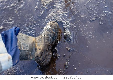 Legs In Boots, Go Through The Mud And Puddles. Workmans Boots