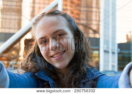 Selfie Photo Of Smiling Teen Girl In A Street,big City