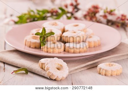 Canestrelli Biscuits With Cappuccino On Wooden Table.