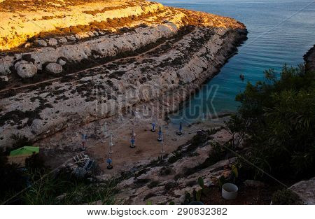 Lampedusa, Italy - July, 30: View Of Cala Greca At Sunset In The Summer Season On July 30, 2018