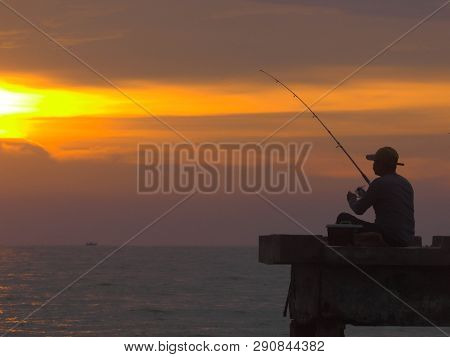 Port Dickson, Malaysia September 14, 2018 :  Jetty And Unidentified People Closeup During Sunset At 