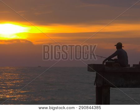 Port Dickson, Malaysia September 14, 2018 :  Jetty And Unidentified People Closeup During Sunset At 