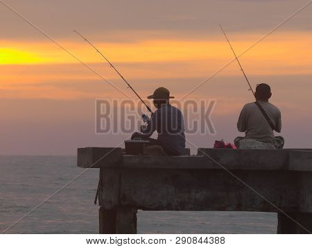 Port Dickson, Malaysia September 14, 2018 :  Jetty And Unidentified People Closeup During Sunset At 