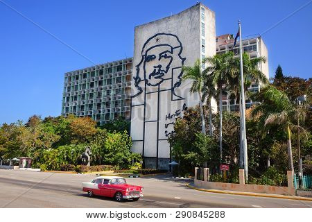 Plaza De La Revolution, Havana, Cuba - 30/03/2018: Tourists On A Red Retrocar Ride Through The Build