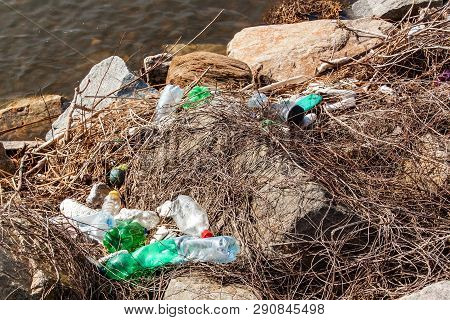 Plastic Waste On The Lake Shore In The Czech Republic. Environmental Pollution. Recycling Of Plastic