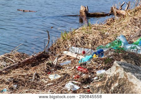 Plastic Waste On The Lake Shore In The Czech Republic. Environmental Pollution. Recycling Of Plastic