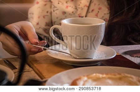 A Cup Of Coffee For Breakfast In A Cafe