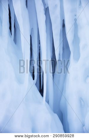 Large Icicles. Winter Frozen Nature