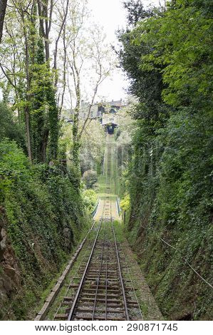 The View Of Railroad Through Green Trees Between Montecatini Terme And Montecatini Alto, Tuscany, It
