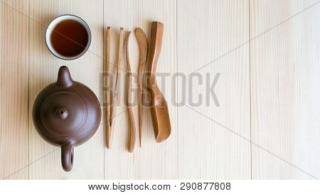 A Set Accessories For The Tea Ceremony. Dishe Tea And Wooden Sticks On A Light Background.