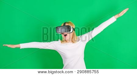 The Woman With Glasses Of Virtual Reality. Confident Young Woman Adjusting Her Virtual Reality Heads