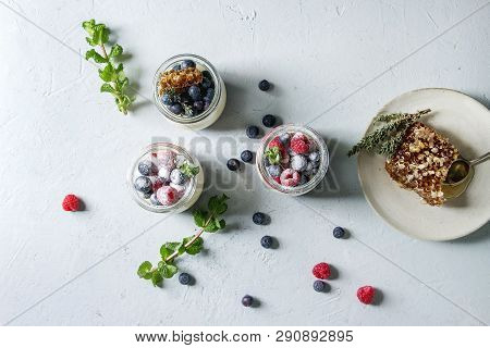 Homemade Classic Dessert Panna Cotta With Raspberry And Blueberry Berries And Jelly In Jars, Decorat