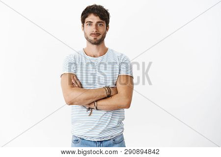Portrait Of Good-looking Confident And Enthusiastic Young Masuline Male Fitness Instructor Holding H