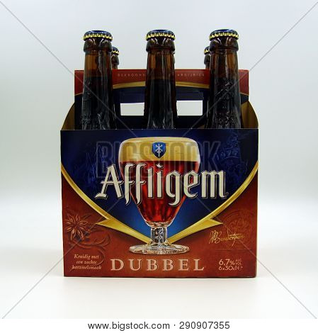 Amsterdam, The Netherlands - March 22, 2018: Sixpack Of Belgian Affligem Dubbel Beers Against A Whit