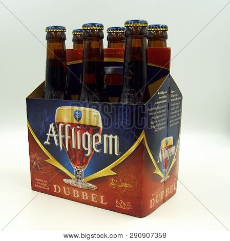 Amsterdam, The Netherlands - March 22, 2018: Sixpack Of Belgian Affligem Dubbel Beers Against A Whit
