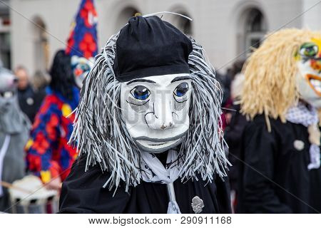 Basel, Switzerland - March 11, 2019: Participant At The Parade Of The Carnival Of Basel. The Carniva