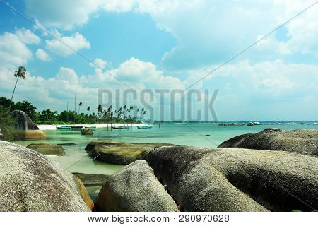 Scenic View Of Belitung Beach With Bigrock Formation In Foreground