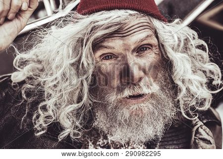 Close Up Portrait Of Almsman Whose Greeting The Passerby.