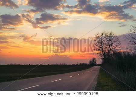 Sunset In Countryside Landscape. Fields And Countryside Landscape. Nature Landscape. Sunset In Wheat