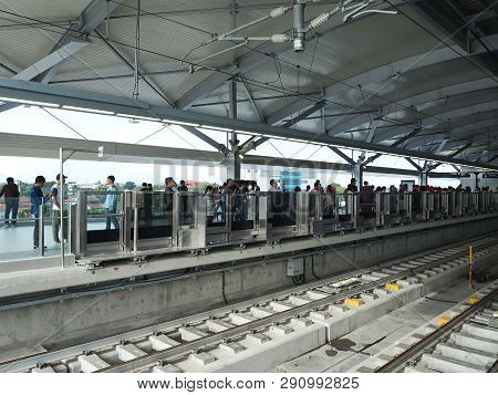 Jakarta, Indonesia - March 23, 2019: Crowd Of People Standing On The Platform Waiting For The Train 