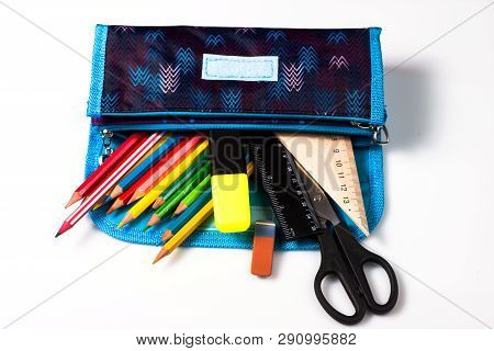 Pencil Case On A White Background. Pencils In The Pencil Case. Ruler And Scissors. School Supplies