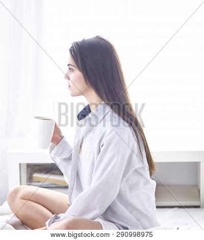 Young Beautiful Happy Brunette Woman In Black Silk Dressing Gow