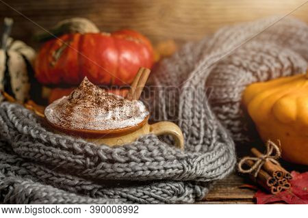 Autumn Concept, Still Life Of Pumpkin Latte With Whipped Milk Cream And Cinamon. Colorful Pumpkins A