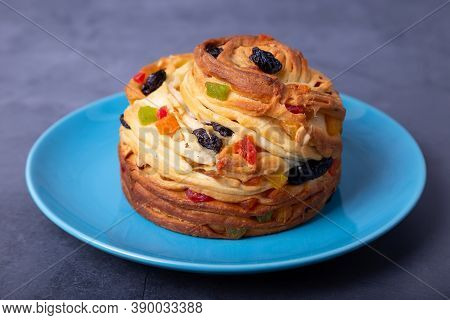 Craffin (cruffin) With Raisins, Nuts And Candied Fruits. Easter Bread Kulich And Painted Eggs. Easte
