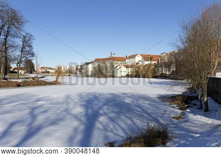 Colorful Royal Snowy Medieval Town Pisek Above The Frozen River Otava, Czech Republic