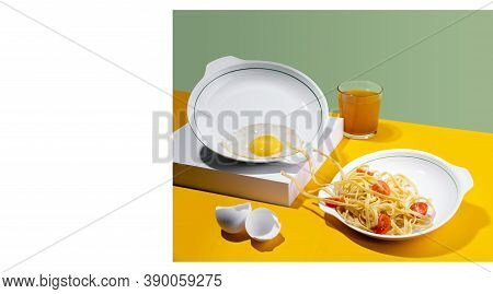 Concept Pastafarianism. Monster Noodles Spagetti In A White Plate Attacking Fried Eggs For Breakfast