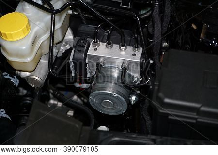The Control Unit For The Anti-lock Braking System Abs Of A Modern Car Is Installed In The Engine Com